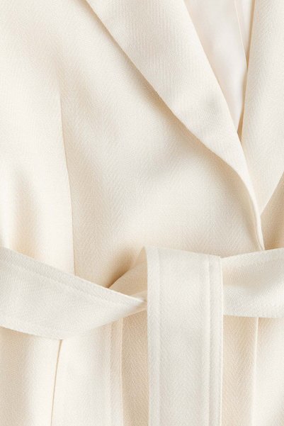 H&M سترة بحزام مربوط بنسيج مزخرف