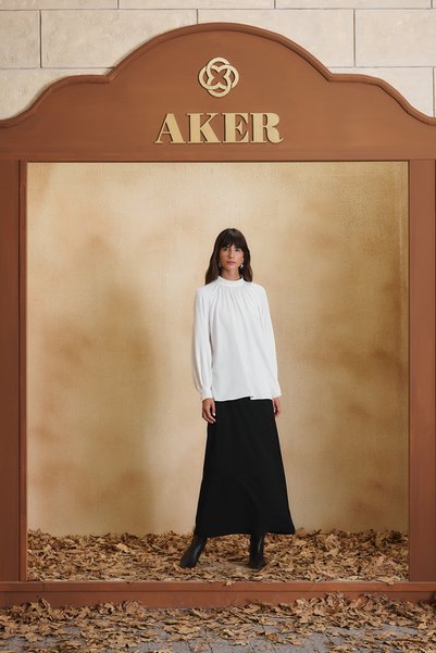 Aker بلوزة إكرو مفصلة