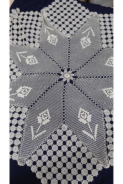 Papatyam A crocheted side table made from Filoş yarn, 105 centimeters in diam...