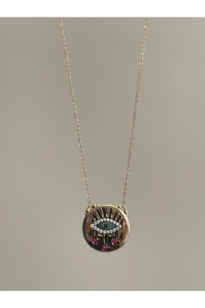 mibrillo Eye pendant on a plate