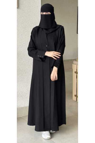 TAJ ALHASHMA A Practical Abaya, Cut in Half, Made from a Lightweight, Flowing Fabric.