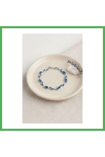 Nur store Çanta Rice-Patterned Silver-Colored Women's Bracelet with Blue Zirc...