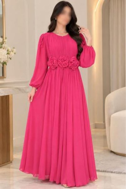Azouq Fuchsia long dress with a flowing design and elegant puffed sleeves |