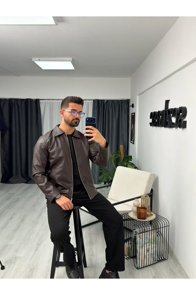 SEZBASE جاكيت جلدي كلاسيكي بتصميم بسيط وياقة أنيقة وسحاب.