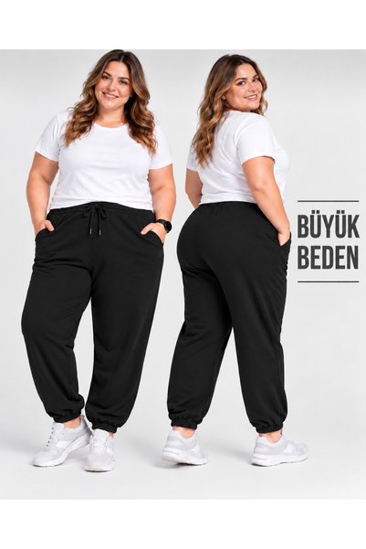 luci sports Pantaloni de trening (joggers) pentru femei cu manșete elastice