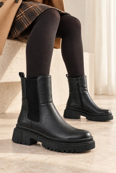 U.S. Polo Assn. Γυναικεία μπότες Chelsea με εσωτερική επένδυση που κρατάει τη...