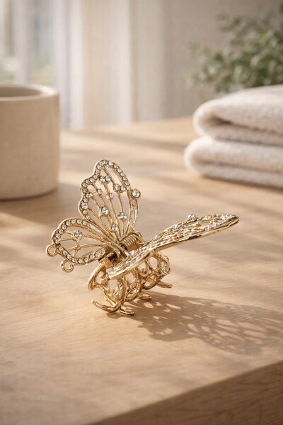 Comerivo Clamă de păr fluture metalic auriu cu strasuri argintii, 6 cm