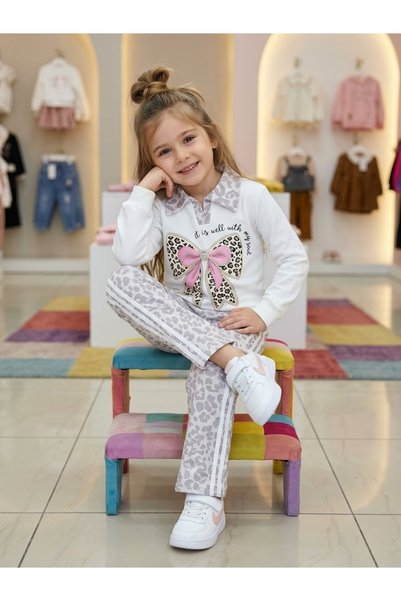 Ütk kids طقم بناتي مكون من قطعتين، يتضمن بنطلونًا بنقشة الفهد مزينًا بشريط ور...