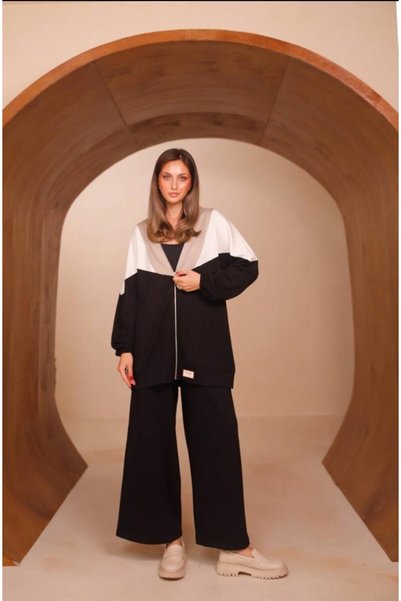 Trendingsize Women's two-piece set with a modal-textured paneled top, ruffles...