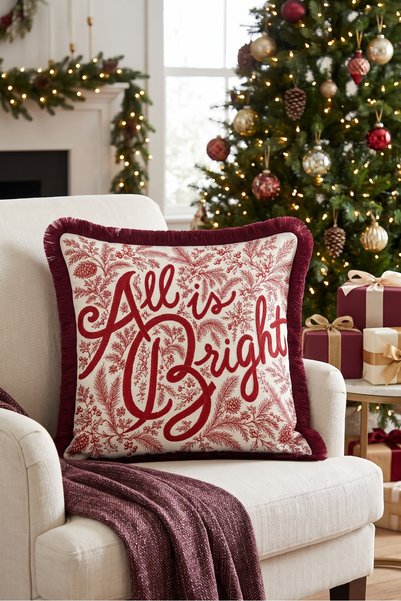 Evimde Bambaşka غطاء وسادة «All Is Bright» باللون الكريمي بنقوش رأس السنة ومز...