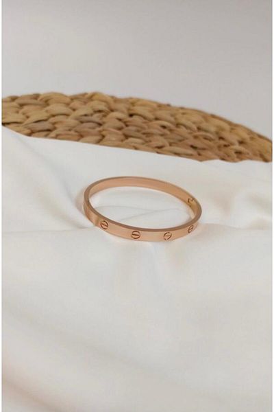 AVON Unisex Non-Tarnish Rose Alloy Cartier Cuff Bracelet