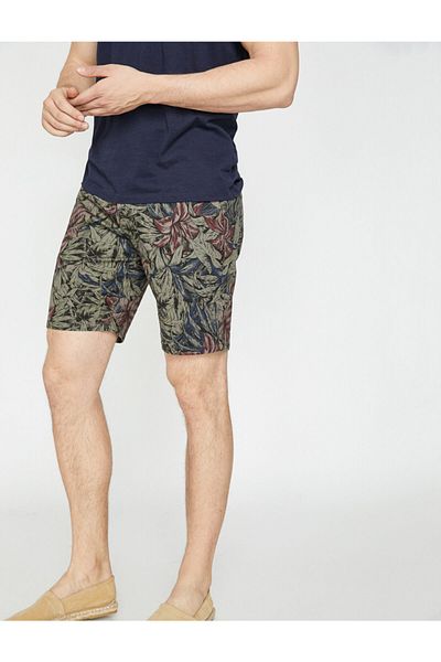 Koton Grüne Herren-Shorts mit normaler Taille und Taschendetails 9YAM44286OW