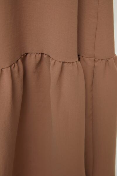 Trendyol Modest Μπεζ σταντ γιακά μανίκι ελαστικό Aerobin υφασμένο φόρεμα TCTSS22EB0010