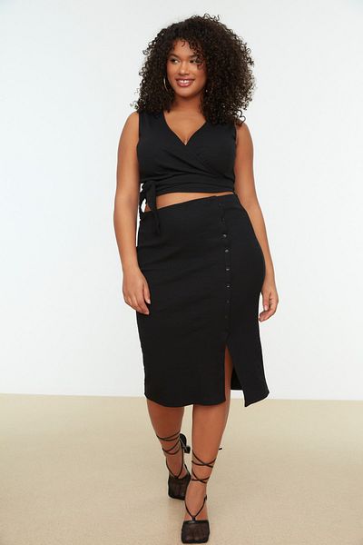 Trendyol Curve Set aus schwarzem, geschlitztem, detailliertem Strickober- und -unterteil TBBSS22AU0049