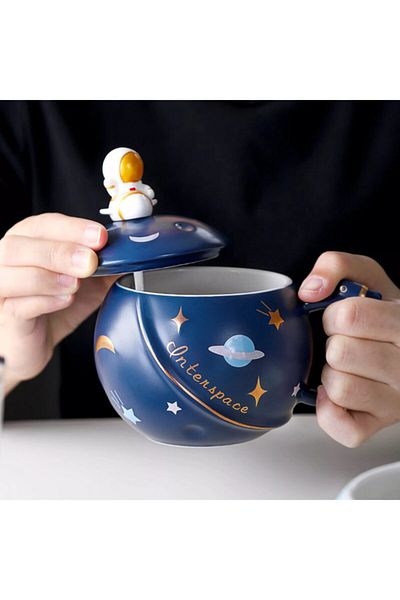 StellaStore كوب بتصميم رائد فضاء مع غطاء