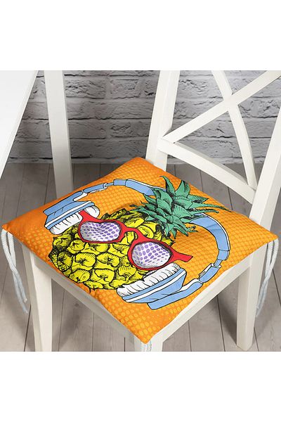Realhomes Pofidik Chair Cushion with Summer Pineapple Design on Orange Background