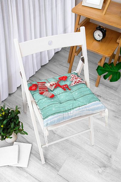 Realhomes New Year Concept Patterned Decorative Fluffy Chair Cushion on Green Background