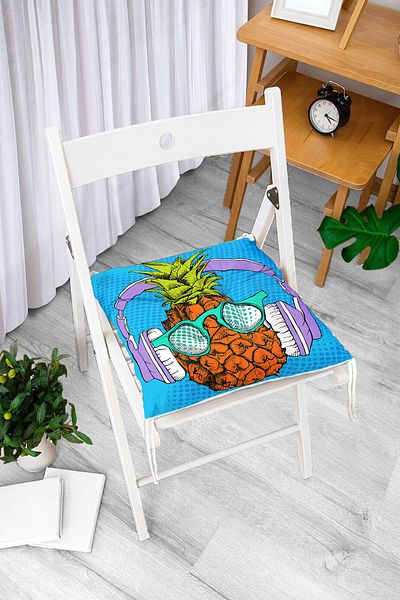 Realhomes Fluffy Chair Cushion with Tropical Pineapple Design with Blue Background