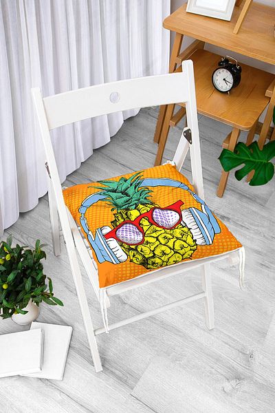 Realhomes Pofidik Chair Cushion with Summer Pineapple Design on Orange Background