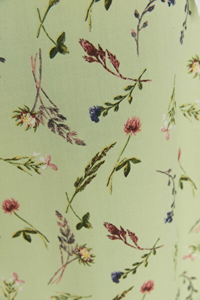 Trendyol Modest Fusta necăptușită țesută cu clopoței cu model floral verde TCTSS22EE0006