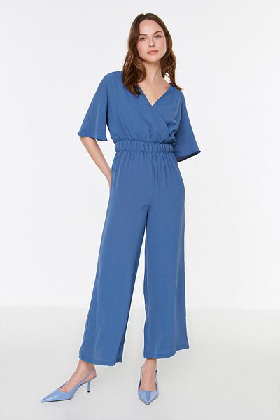 Trendyol Collection Blauer gewebter Jumpsuit mit zweireihigem Kragen und weitem Bein TWOSS20TU0100