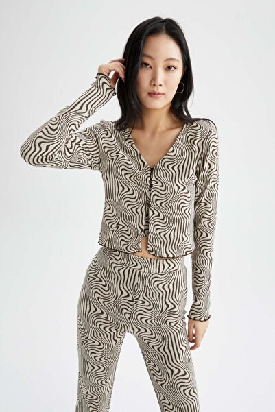 DeFacto Testhezálló V-nyakú zebra mintás kardigán