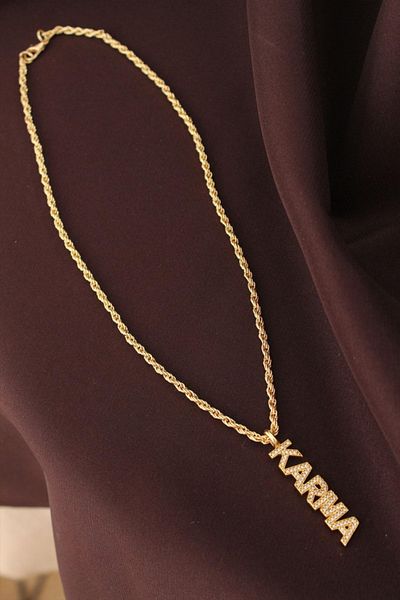 Clariss قلادة من حجر الزركون باللون الذهبي مع حروف مختلطة