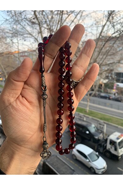 vevasilver مسبحة مطلية بالماء الذهبي مع شرابات فضية من حجر العنبر المضغوط.
