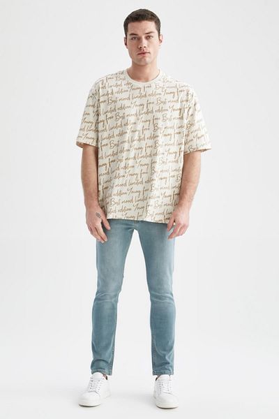DeFacto Cool Oversize Fit μοτίβο με λαιμόκοψη με κοντό μανίκι βαμβακερό χτενισμένο μπλουζάκι