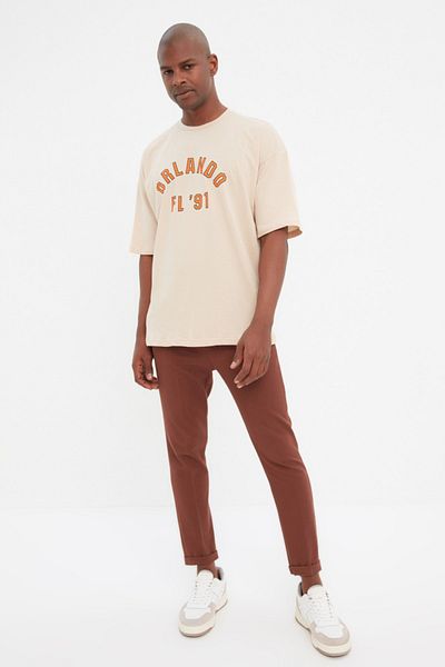 Trendyol Collection Μπεζ 100% βαμβακερό μπλουζάκι με στάμπα City με λαιμόκοψη - TMNSS22TS0304