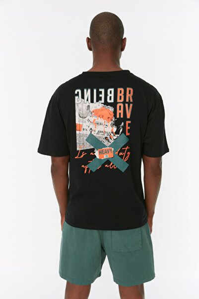 Trendyol Collection Černé oversize bavlněné tričko s potiskem textu - TMNSS22TS2223