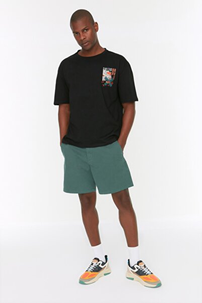 Trendyol Collection Černé oversize bavlněné tričko s potiskem textu - TMNSS22TS2223