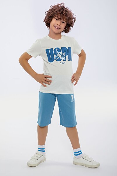 U.S. Polo Assn. بدلة كابري برقبة دائرية للأولاد باللون النيلي من US Polo Assn...