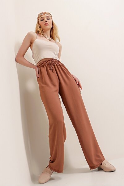 HAKKE Hnědé kalhoty Ayrobin