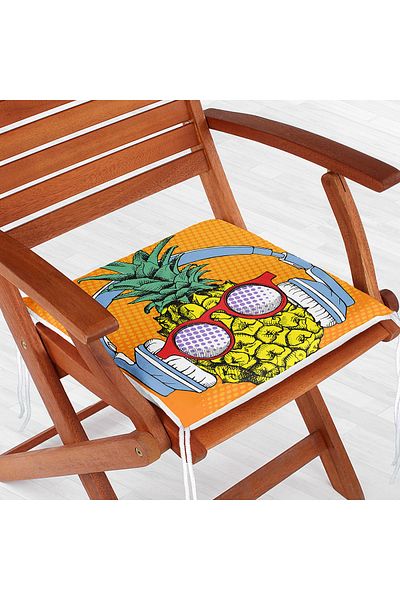 Realhomes Summer Pineapple Design Zippered Chair Cushion on Orange Floor