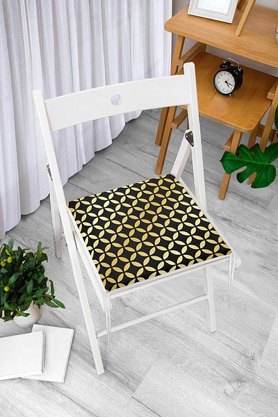 Realhomes Gold Geometric Patterned Zippered Chair Cushion on Black Background