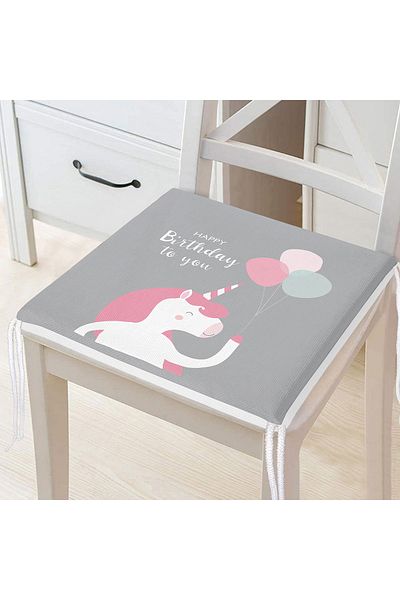 Realhomes Zippered Chair Cushion on Green Floor with Unicorn Design