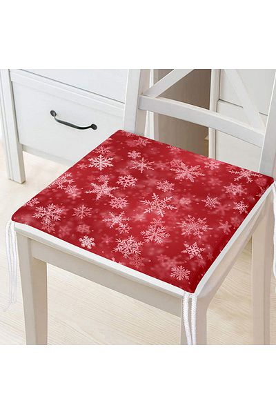 Realhomes Chair Cushion with Zippered Snowflakes on Red Background