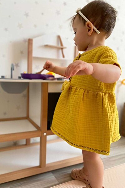 ipek atlas فستان موسلين مطرز بالزعفران