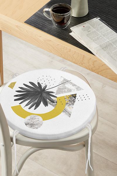 Realhomes Round Zippered Chair Cushion with Flower Motif that Spills Seeds on Geometric Marble Floor