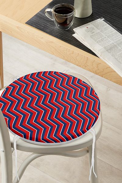 Realhomes Modern Round Zippered Chair Cushion with Burgundy Colored Geometric Drawing on Navy Blue Floor