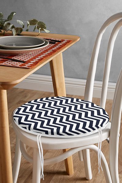 Realhomes Modern Round Zippered Chair Cushion with Dark Blue Colored Geometric Drawing on White Background