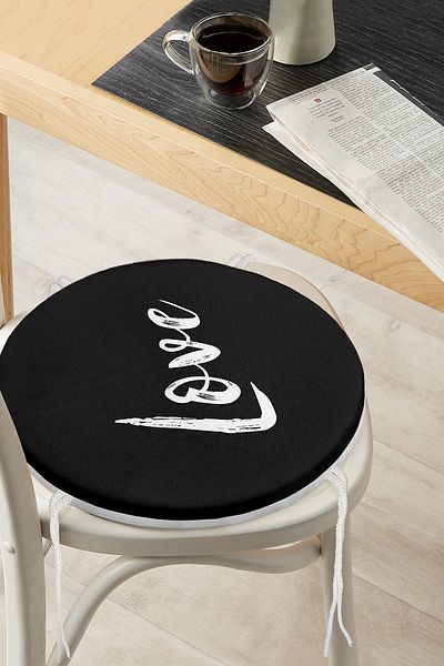 Realhomes Modern Round Zippered Chair Cushion with Love Written on Black Background