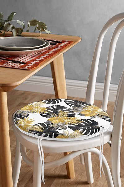 Realhomes Modern Round Zippered Chair Cushion with Gold Detail and Black Leaf Pattern on White Background
