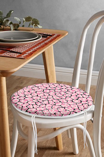 Realhomes Modern Round Zippered Chair Cushion with Pink Colored Polka Dot Pattern on Black Background