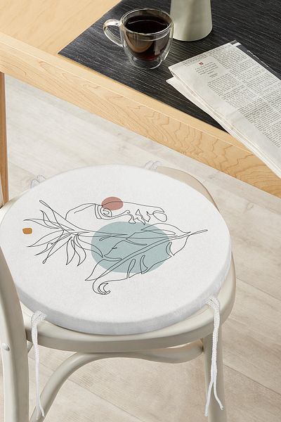 Realhomes Round Zippered Chair Cushion with Leaf Pattern on Portrait Drawing
