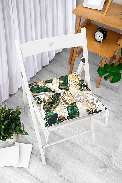 Realhomes Pofidic Chair Cushion with Gold Detailed Tropical Leaf Design