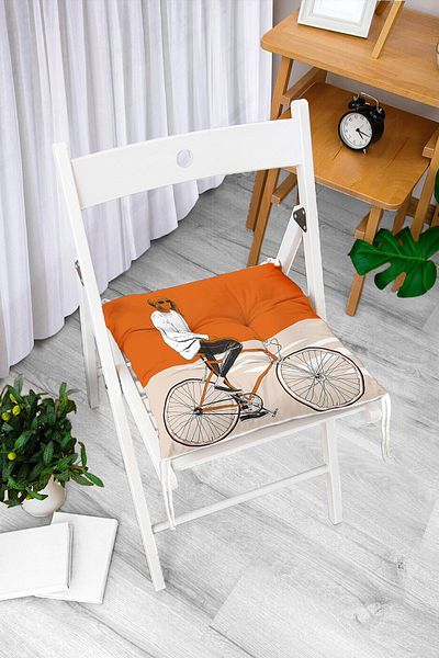 Realhomes Dark Orange Cream Floor Bicycle Man Motif Fluffy Chair Cushion