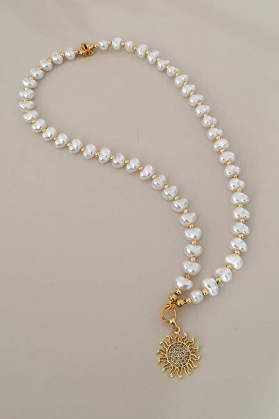 Histakı قلادة من اللؤلؤ بطرف الشمس