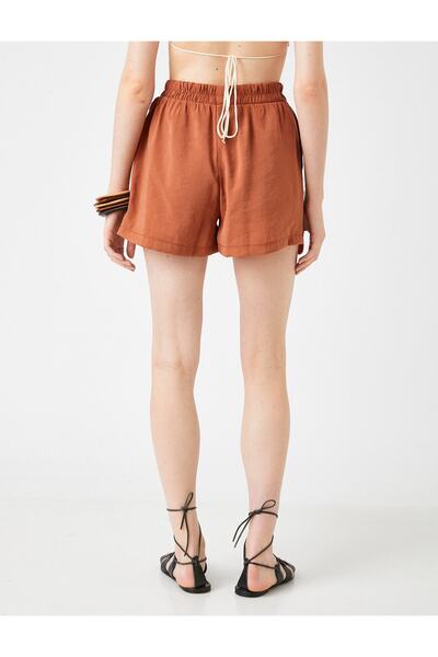 Koton Široké šortky s elastickým pasem a kapsami